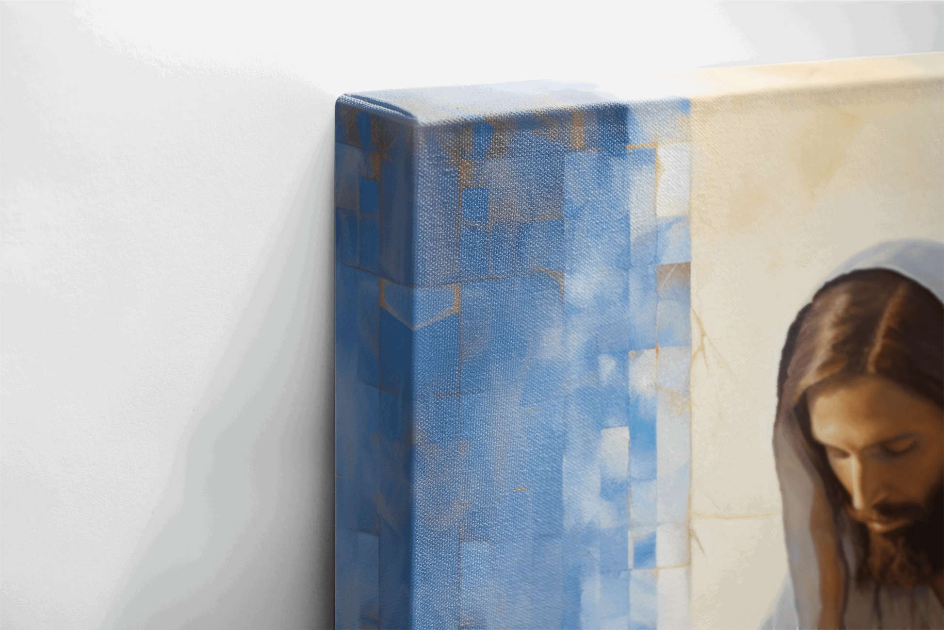 Side view of Canvas Wall Art Painting of Jesus Christ Praying in a white robe in front of abstract blue background