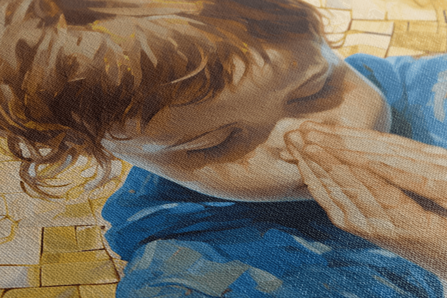 Detailed closeup of Canvas Wall Art Painting of a young child kneels in prayer against a radiant golden background
